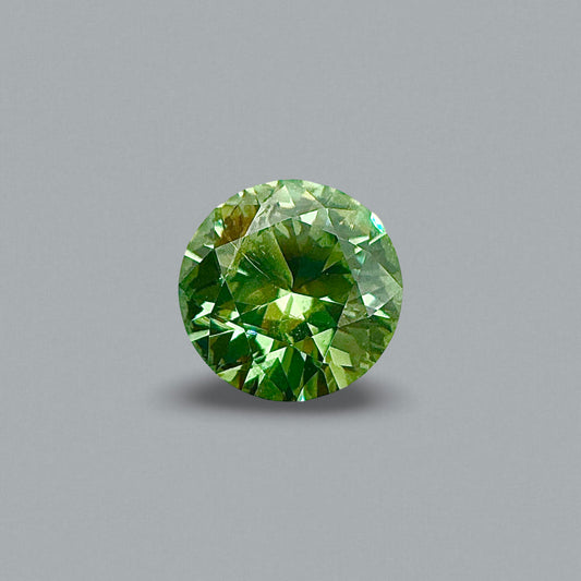 [BELLEROPHON] 1.19 CTS Intense Green Demantoid Garnet