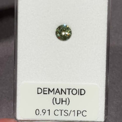 [BELLEROPHON] 0.91 CTS Intense Green Demantoid Garnet