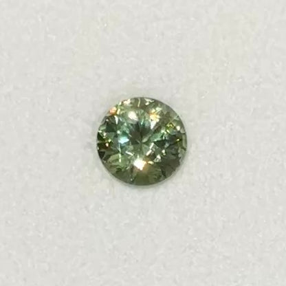[BELLEROPHON] 1.19 CTS Intense Green Demantoid Garnet